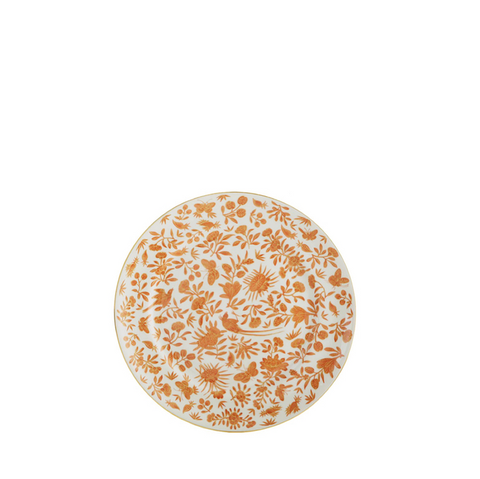 White dessert plate with intricate orange floral, bird, and butterfly pattern.
