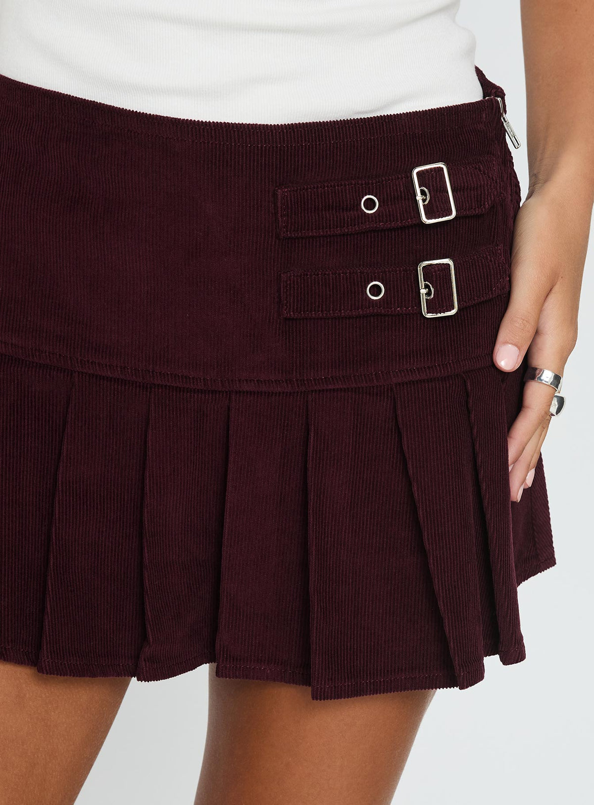 Academe Buckle Pleat Mini Skirt Currant