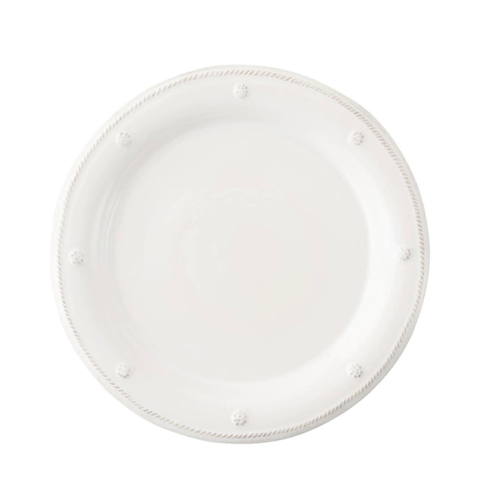 Whitewashed ceramic dinner plate with raised bead and dot detailing on rim.