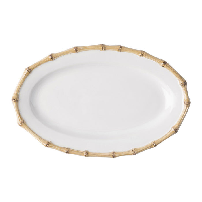 Oval white serving platter with natural bamboo textured rim.