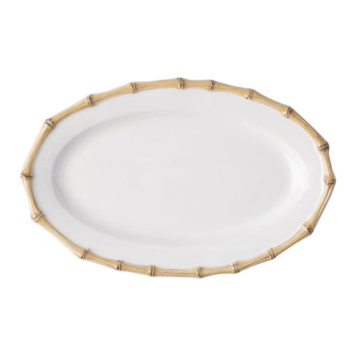 Oval white serving platter with natural bamboo textured rim.