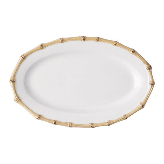 Oval white serving platter with natural bamboo textured rim.