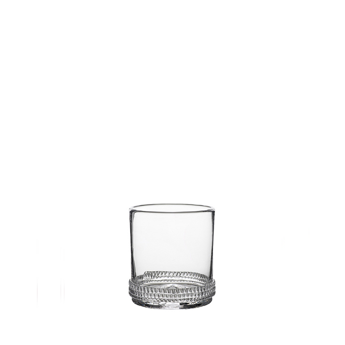 Clear Dean Old Fashioned glass with thick base and textured concentric circle design.