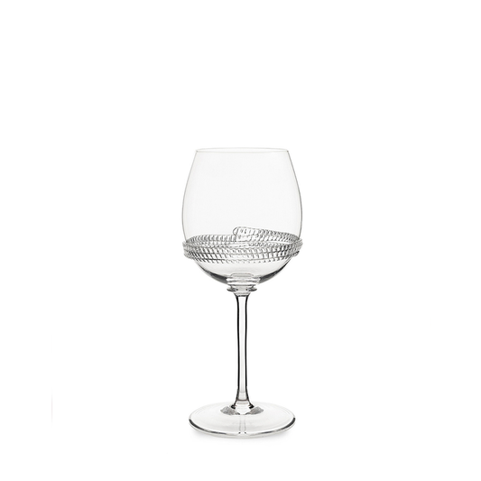 Clear wine glass with a textured dotted pattern around the bowl on a slender stem.