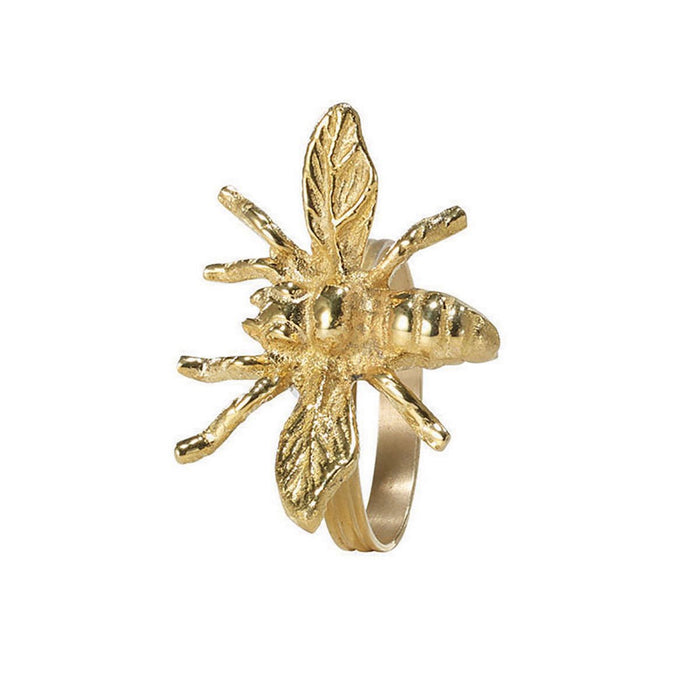 Gold napkin ring shaped like a detailed bee with textured wings and body.