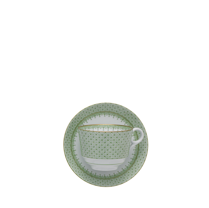 Green apple ceramic tea cup and saucer set with gold lace trim and dotted pattern.