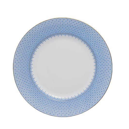 White dinner plate with wide cornflower blue lace-patterned rim and delicate dot detailing.