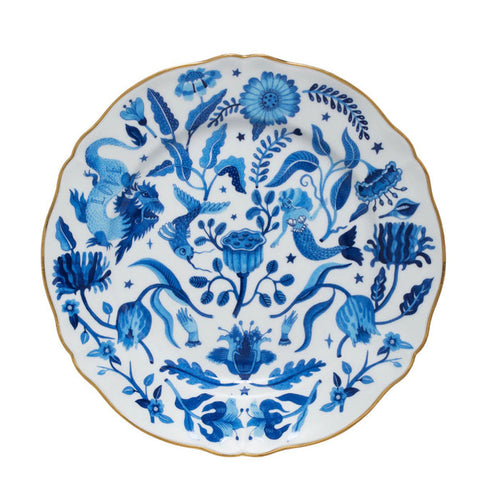 Round ceramic dinner plate with scalloped edges, decorated with intricate blue floral and bird patterns on white background, .