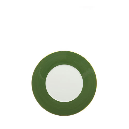 Round dessert plate with a wide dark green rim and a white center.