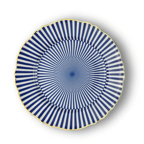 Round dinner plate with blue and white geometric radial stripes and scalloped gold rim.
