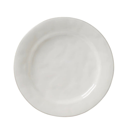 Round whitewashed ceramic dinner plate with subtle textured surface and smooth rim.