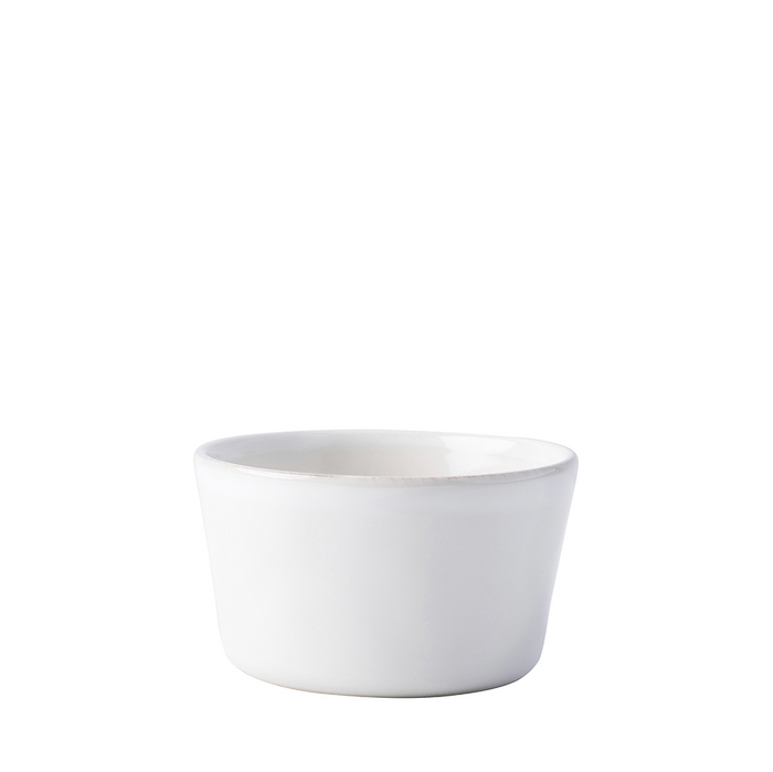 Whitewash ceramic ramekin with smooth matte finish and rounded edges.