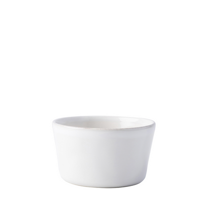 Whitewash ceramic ramekin with smooth matte finish and rounded edges.